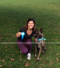 Woman with her award winning Dutch Shepherd