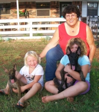 Mom and great grandkids with pups